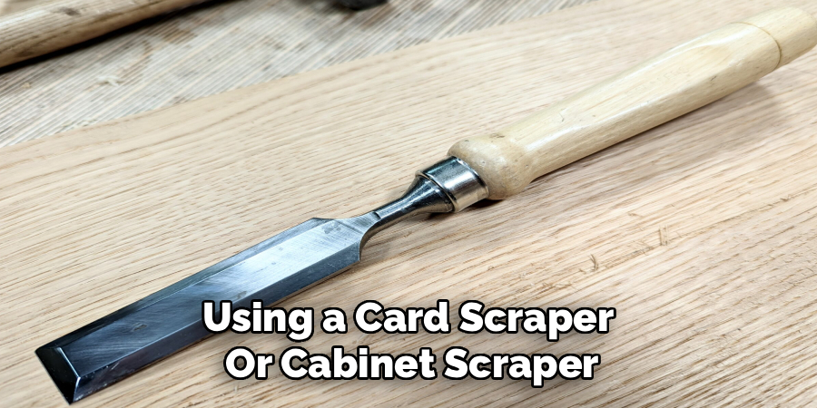 Using a Card Scraper 
Or Cabinet Scraper